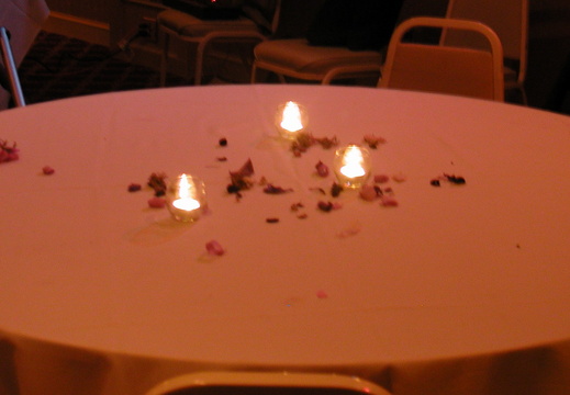 Romantic flowers on a table at the end of the evening.