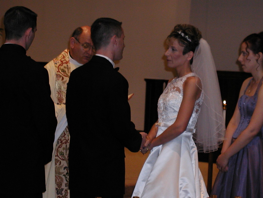 Bob and Claudine exchange their vows.
