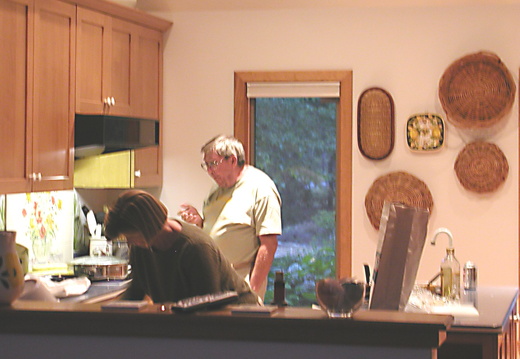 Dad and Penny cooking...