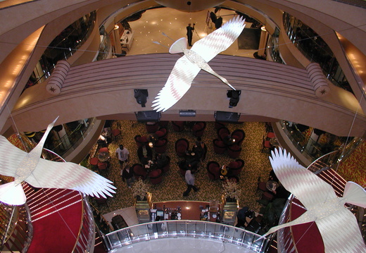 3 crane sculptures in the Atrium of the boat.