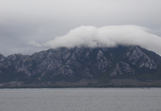 Closer view of the clouds over the mountain.