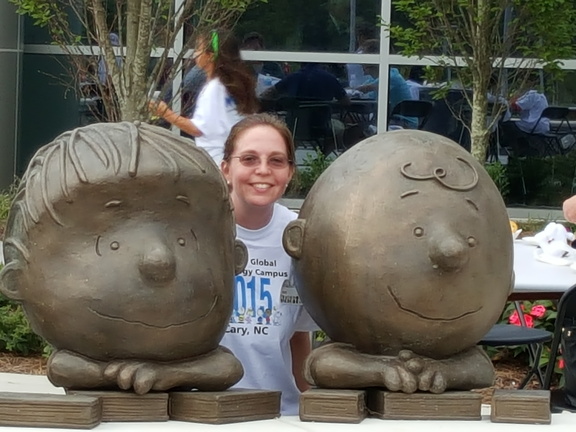 Erica with Linus and Charlie Brown statues
