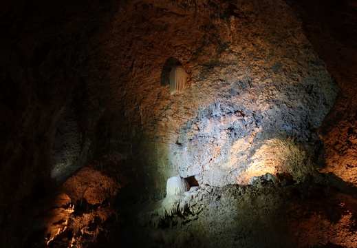 A cluster of stalactites and a cluster of stalagmites 